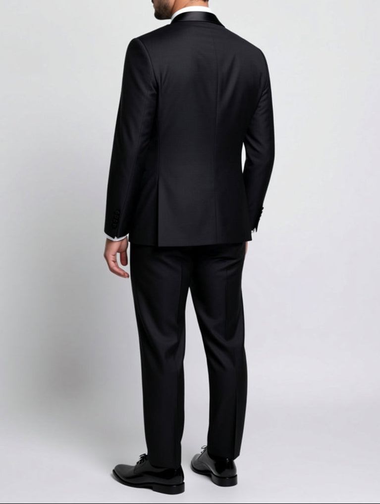 black peak lapel tuxedo with adjustable side-tab trousers.